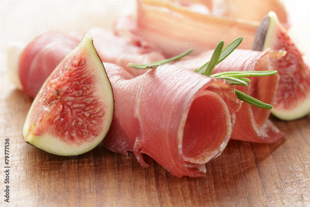 canapes with jamon and figs on wooden board canapes with jamon and figs on wooden board