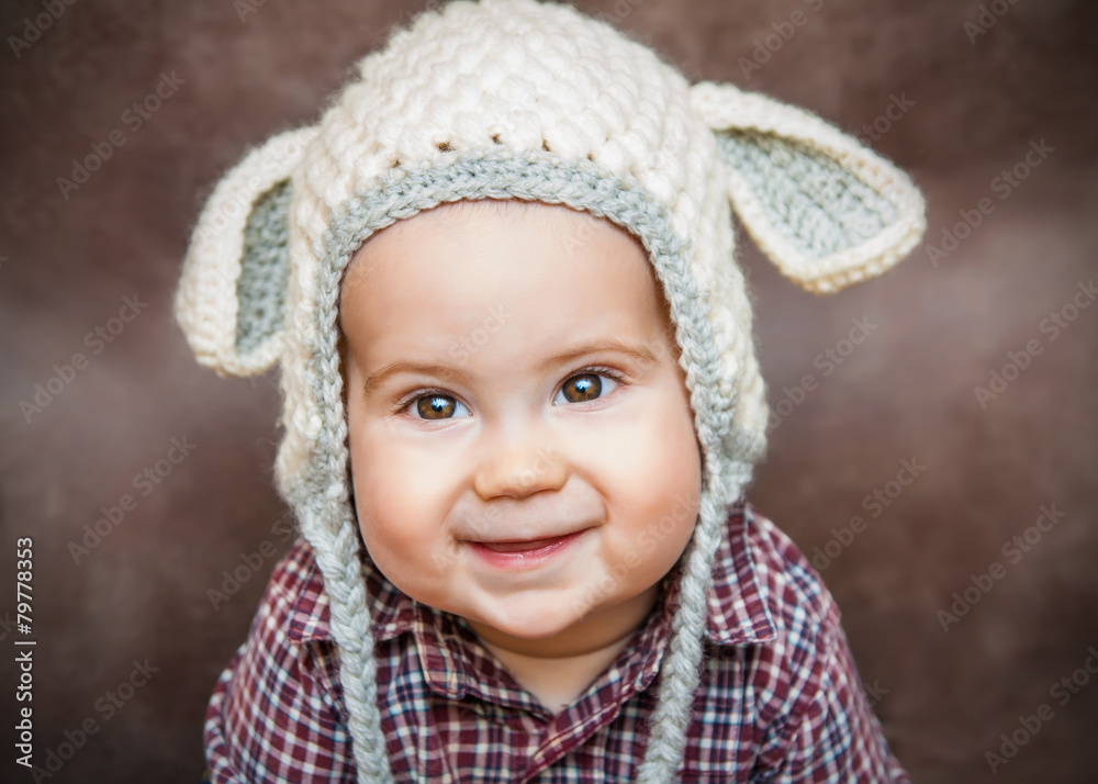 Adorable smiling kid in sheep hat Adorable smiling kid in sheep hat