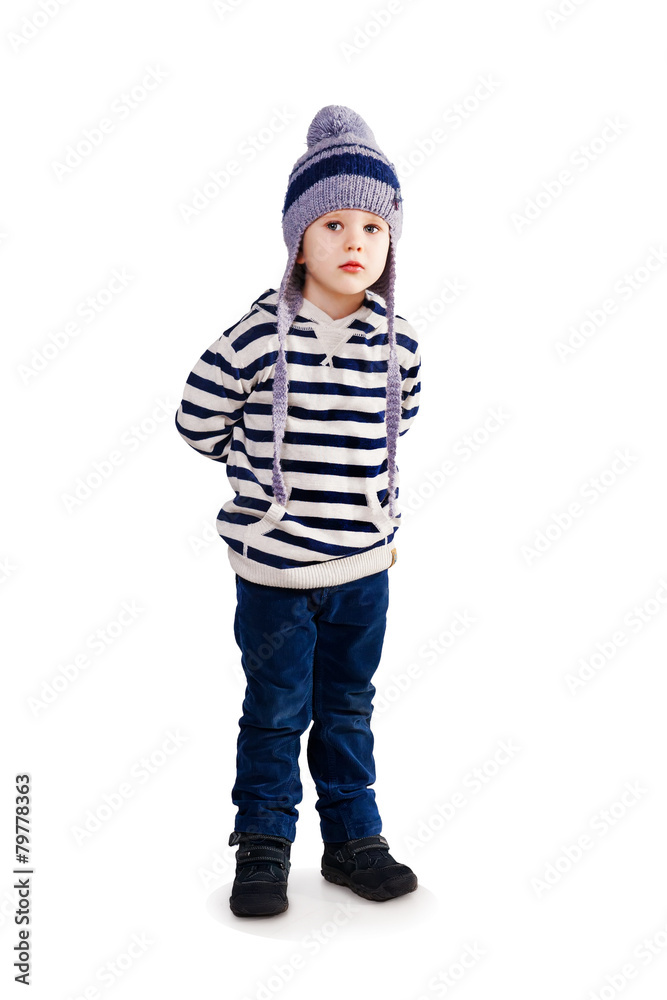 Cute child in winter clothes isolated on white Cute child in winter clothes isolated on white
