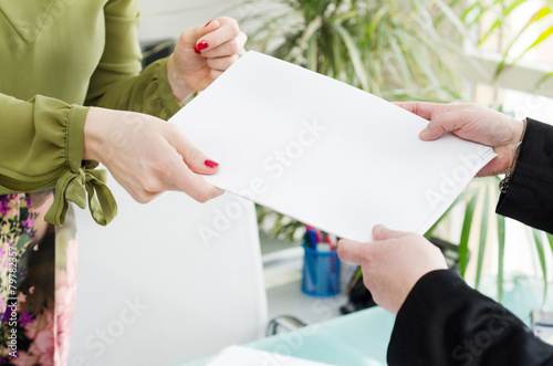Business woman giving document