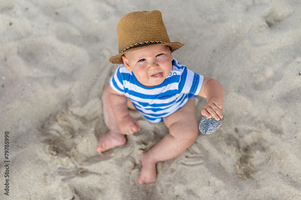 Little baby boy sitting on the sand Little baby boy sitting on the sand