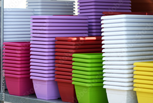 Colorful Flower Plant Pots Piled on the Table