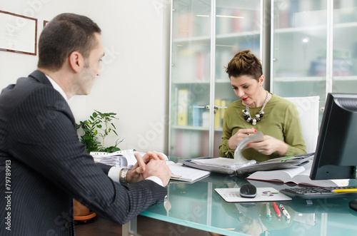 Business partners working in office