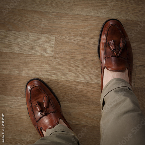 Sockless legs in pants and loafers photo