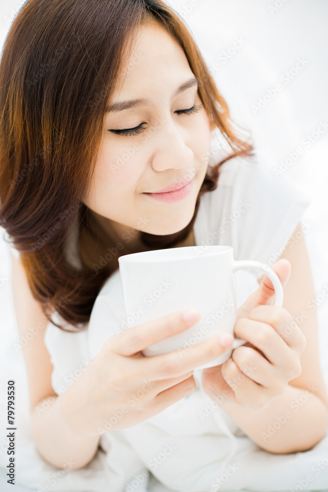 Portrait of a beautiful young woman in bed Portrait of a beautiful young woman in bed