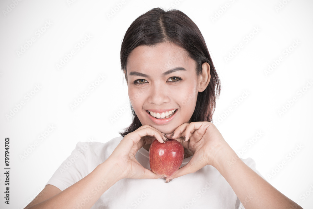 Smiling woman with apple isolated on white Smiling woman with apple isolated on white