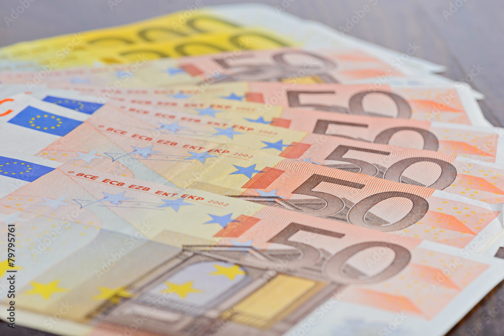 Close-up of Euro banknotes on the table Close-up of Euro banknotes on the table