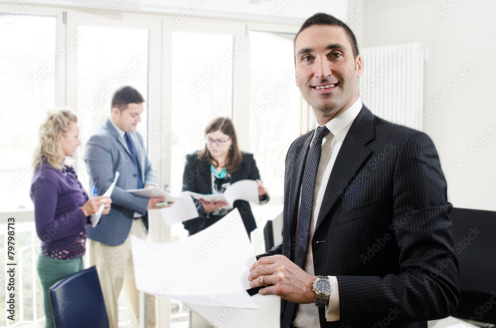 Businessman with people on background Businessman with people on background
