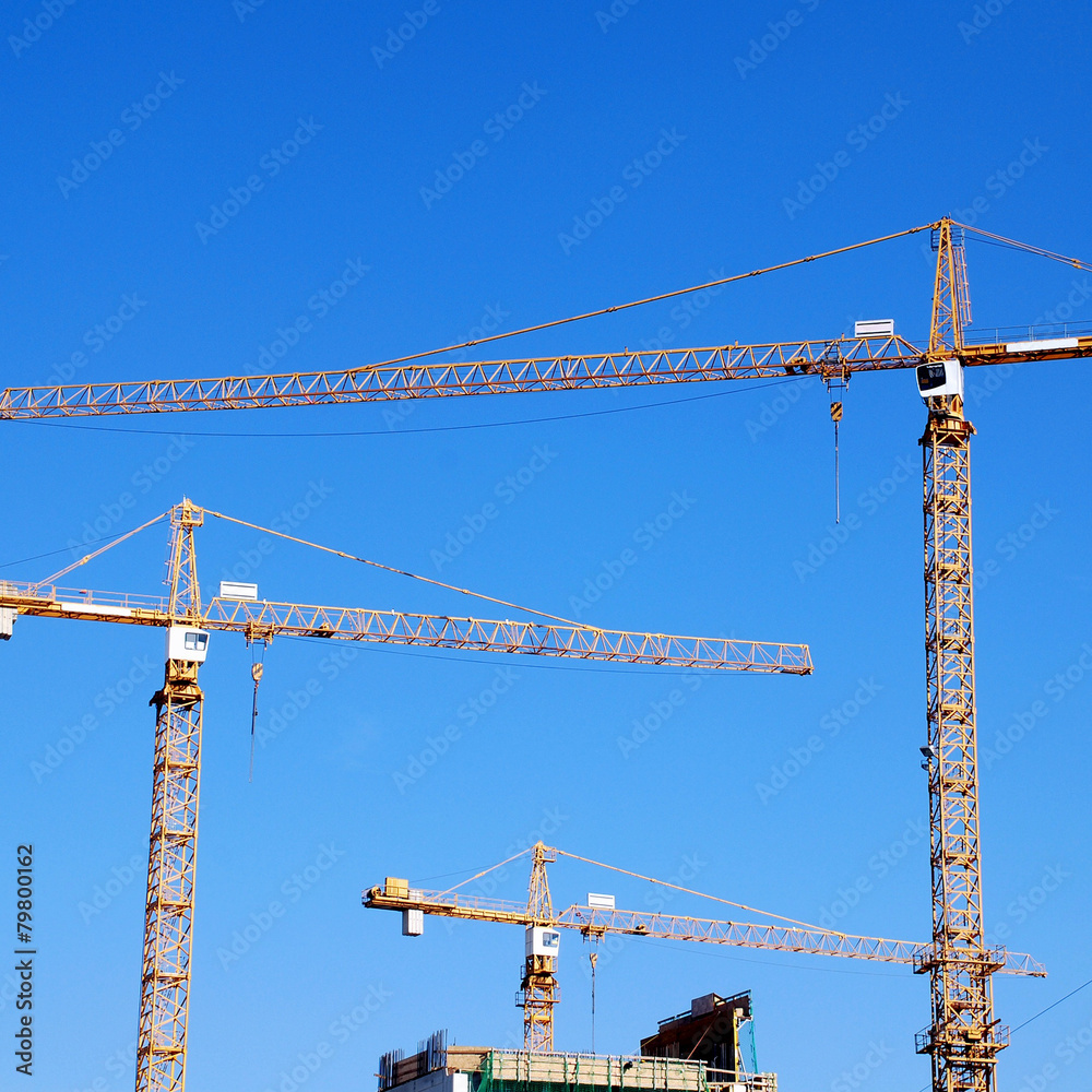 Cranes on building construction Cranes on building construction