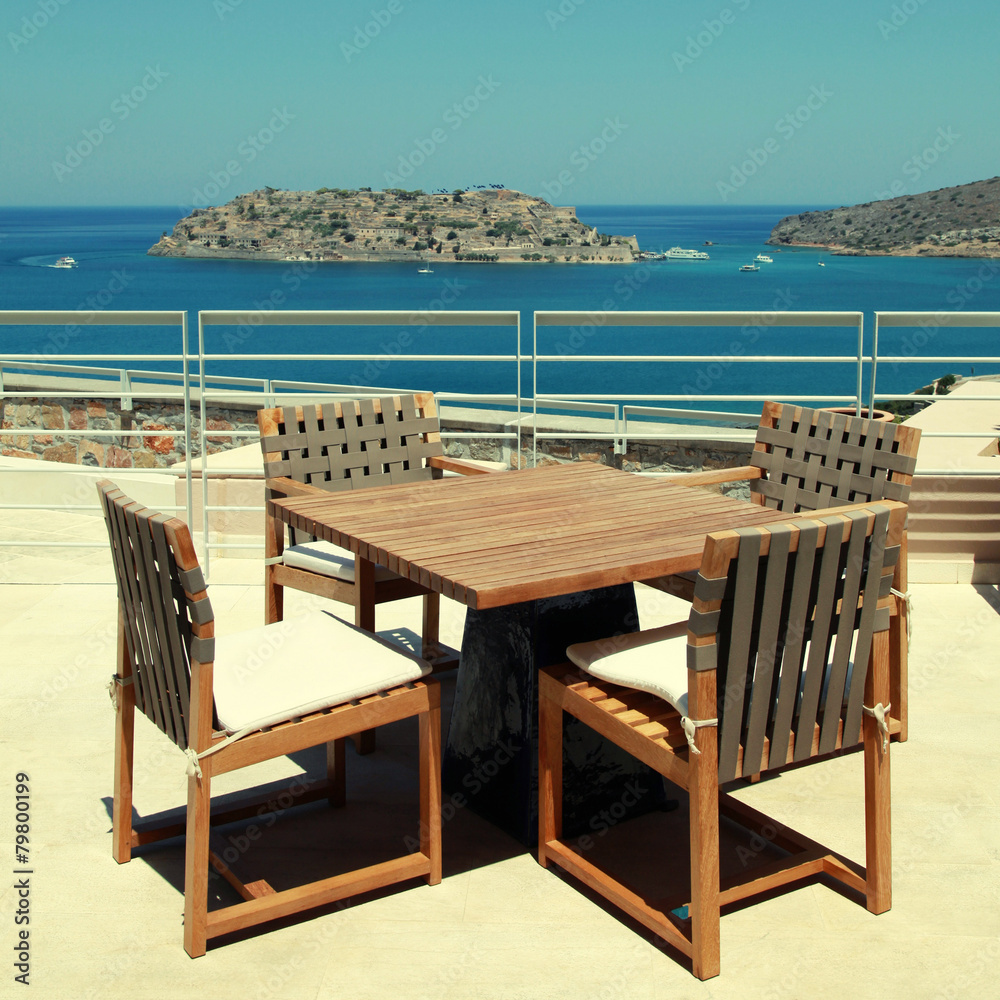 Terrace seaview with outdoor furniture in a luxury resort,Crete