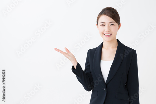 asian businesswoman showing isolated on white background photo