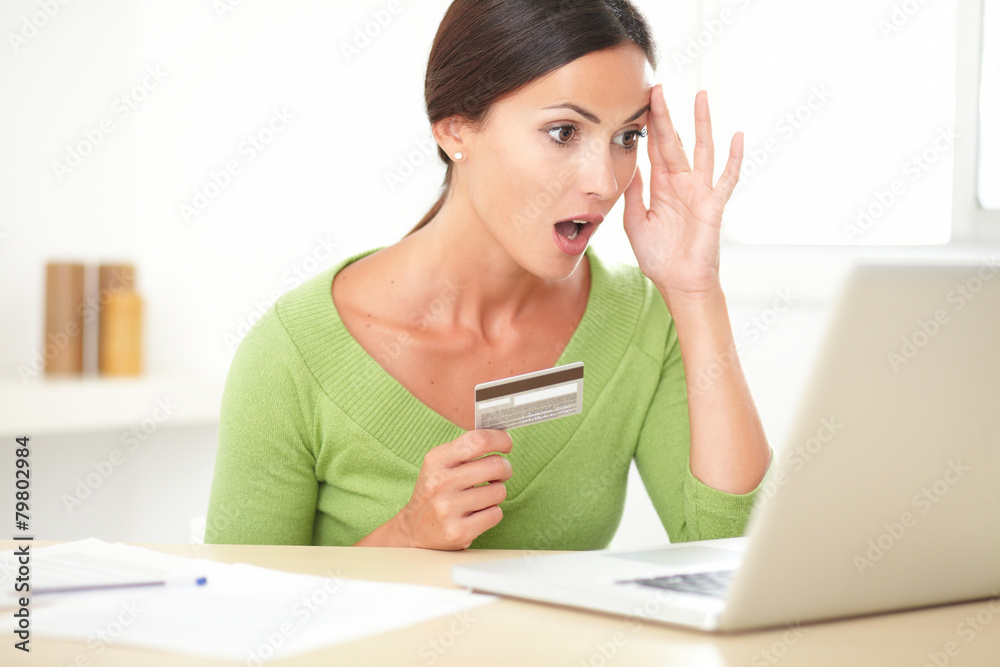 Shocked pretty female surfing the internet Shocked pretty female surfing the internet
