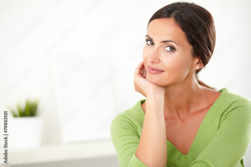 Lovely hispanic female looking elegant indoor Lovely hispanic female looking elegant indoor