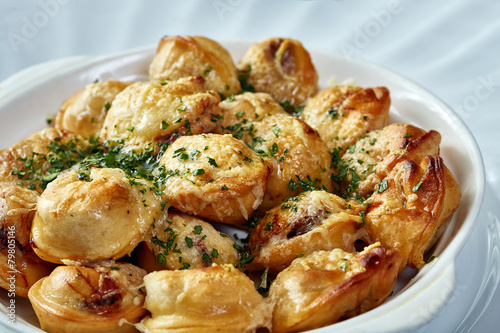 Delicious fried dumplings with melted cheese © Wisky