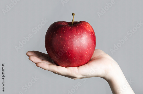 red apple big in hand