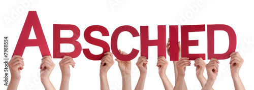 People Holding Straight German Word Abschied Means Goodbye photo