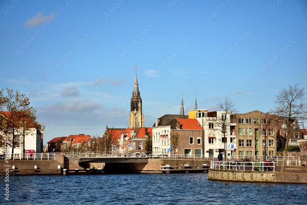 Cityscape of Delft with canal and historic houses