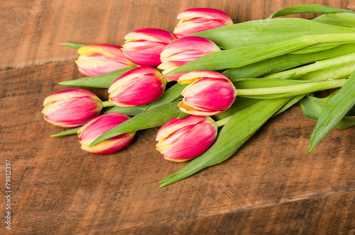 Bouquet of fresh pink and yellow tulips