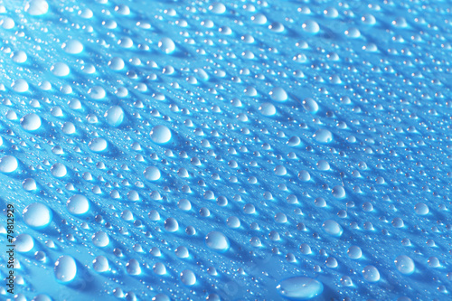 Water drops on light blue background