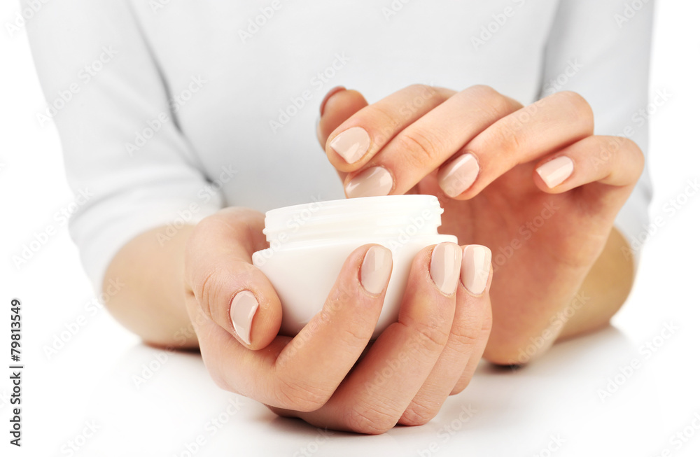 Female hands holding jar of cream isolated on white Female hands holding jar of cream isolated on white