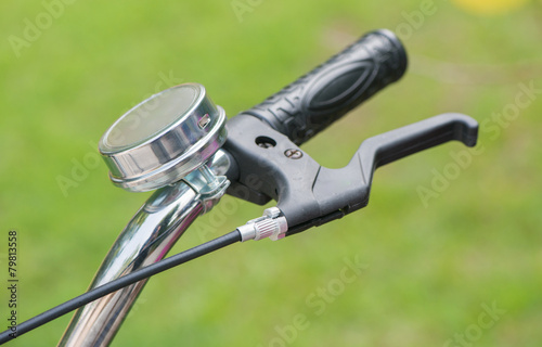Close up handlebars bicycle bell on nature background