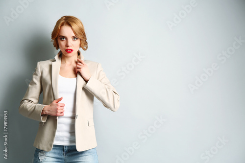 Portrait of young woman on ...