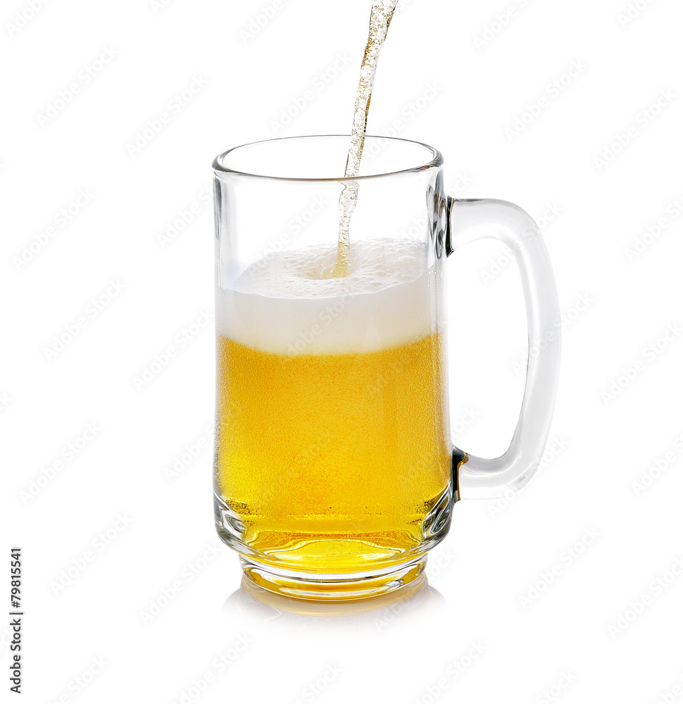 Beer pouring into glass isolated on white Beer pouring into glass isolated on white