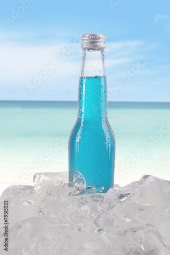Beer with blue color at beach