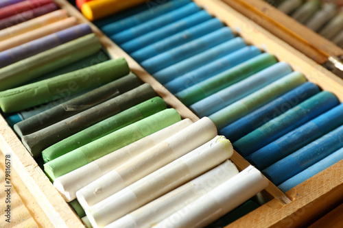 Colorful chalk pastels in box close up