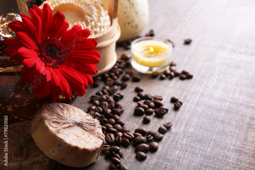 Composition of spa treatment, flowers and coffee beans