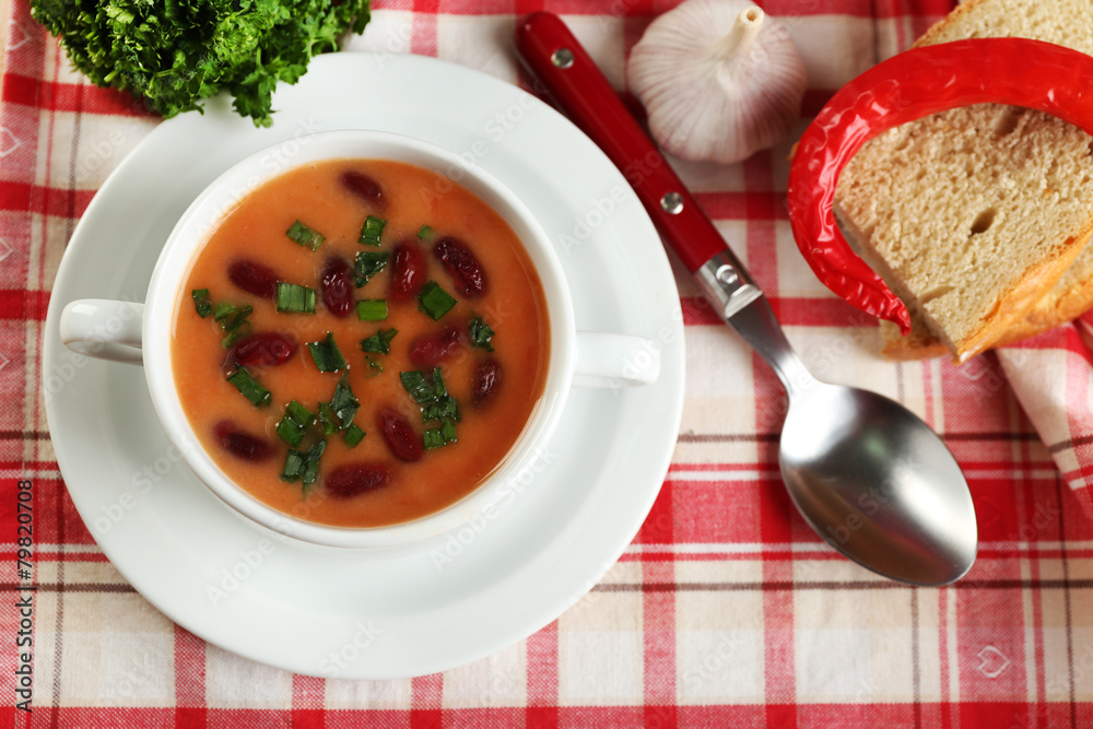 Bean soup in bowl with fresh sliced bread Bean soup in bowl with fresh sliced bread