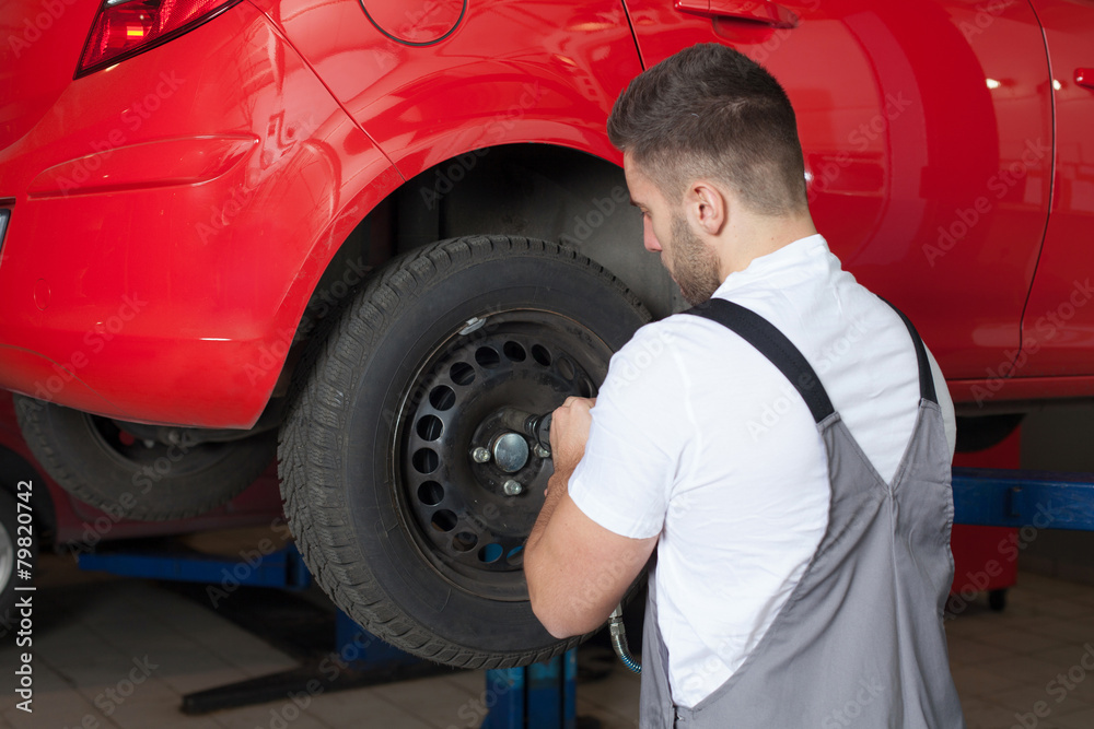 Changing the Tire With an Impact Wrench