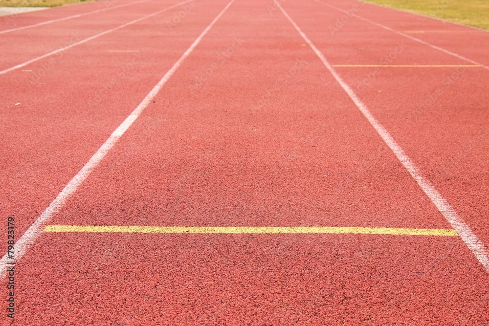 Lines and arrows of running racetrack in outdoor stadium Lines and arrows of running racetrack in outdoor stadium