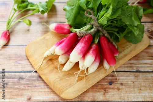 Fresh radishes on a cutting board