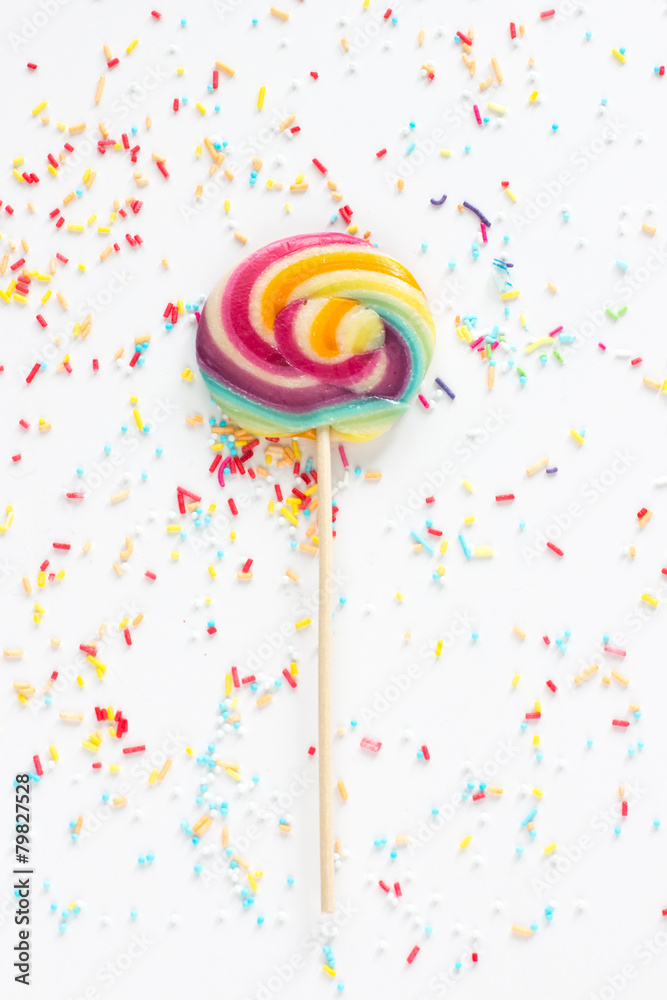 candy - colorful sugar sprinkles and a lollipop