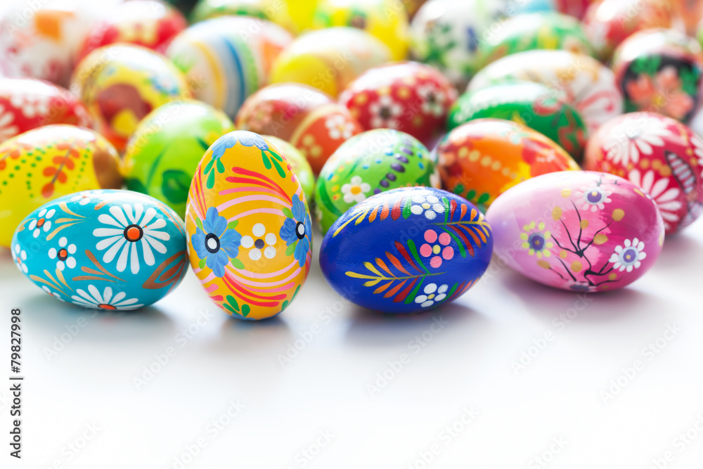 Traditional hand painted Easter eggs on white. Spring patterns Traditional hand painted Easter eggs on white. Spring patterns