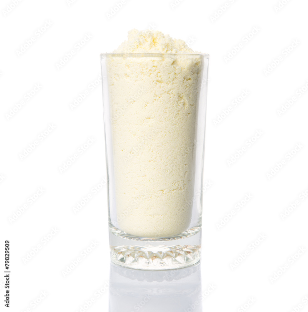 Full cream milk powder in a glass over white background Stock Photo ...