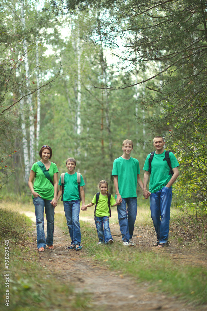 Cheerful family in green