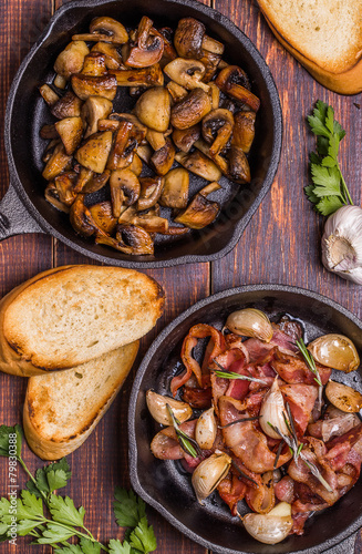 Fried mushrooms with bacon, garlic, rosemary
