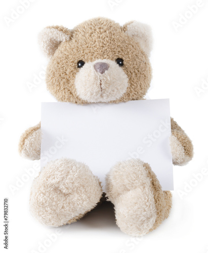 Bild auf Leinwand teddybear holding paper or greeting card