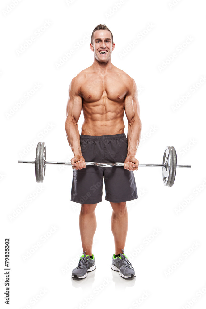 Muscular bodybuilder guy doing exercises with dumbbells over whi Muscular bodybuilder guy doing exercises with dumbbells over whi