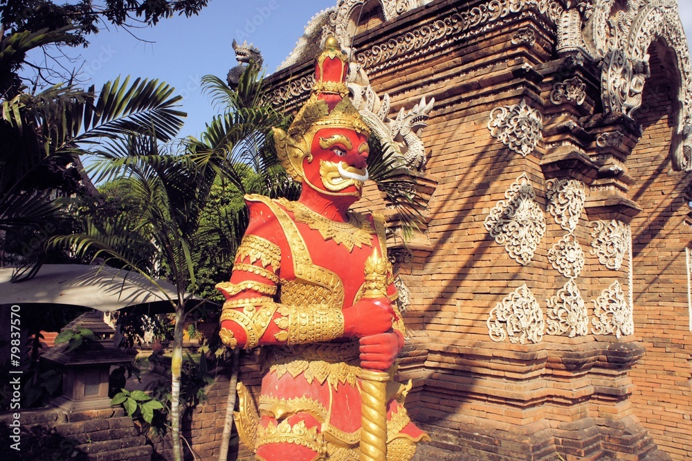 Fototapeta premium Standing Buddhist Gnome statue in Northern Thailand