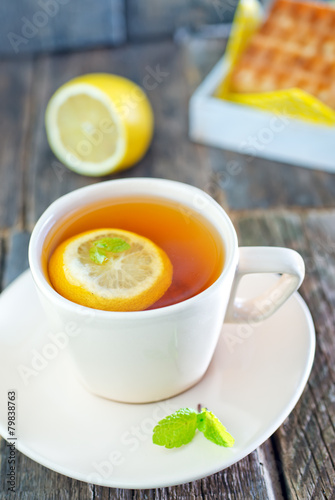 tea with lemon and waffle