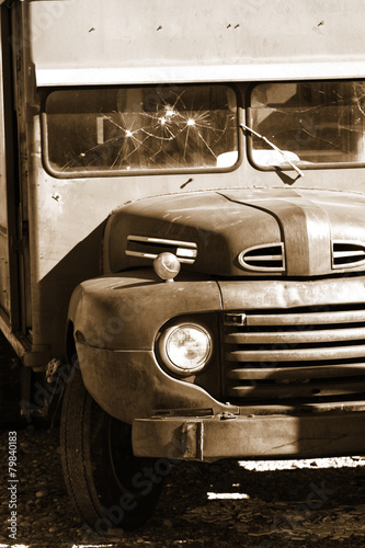 Old classic abandoned truck in sepia color