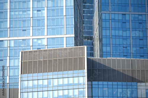 Skyscrapers in modern office business cluster. Close up view