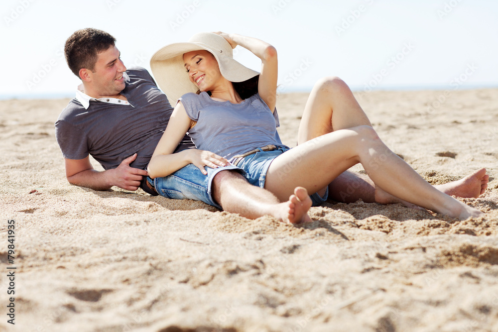 happy people are relaxing on a beach happy people are relaxing on a beach
