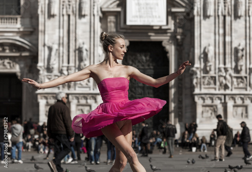 Beautiful dancer wearing pink dress performing in Milan