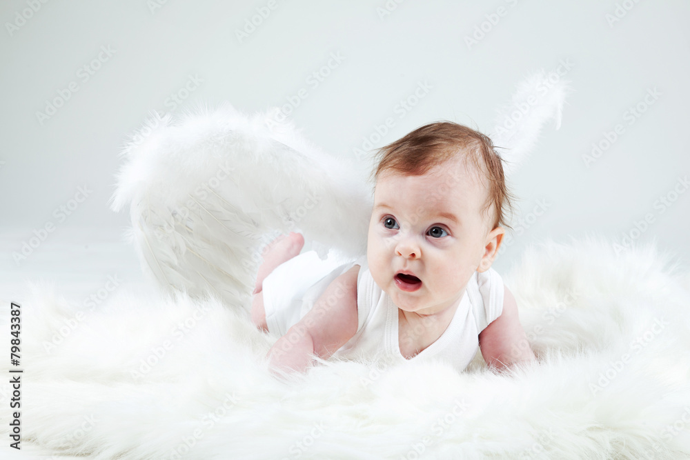 Portrait of a young child dressed in an angel Portrait of a young child dressed in an angel