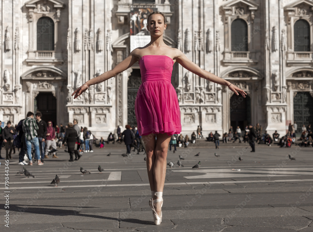 Pretty dancer posing near Milan Cathedral Square