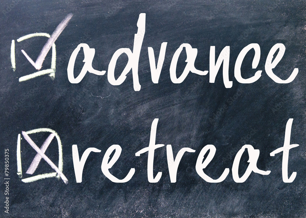 Fototapeta premium retreat and advance choice on blackboard